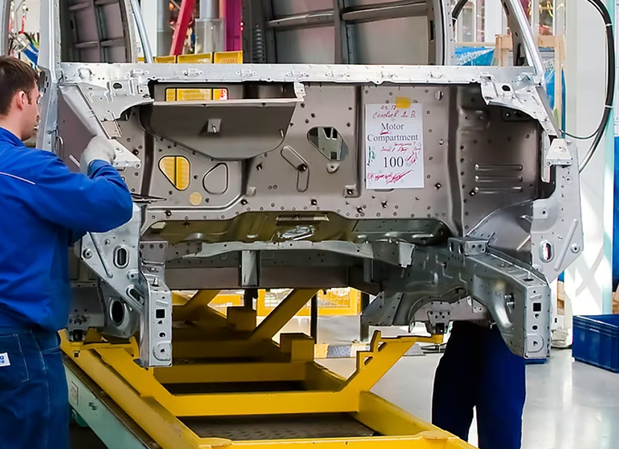 Man assembling metalwork